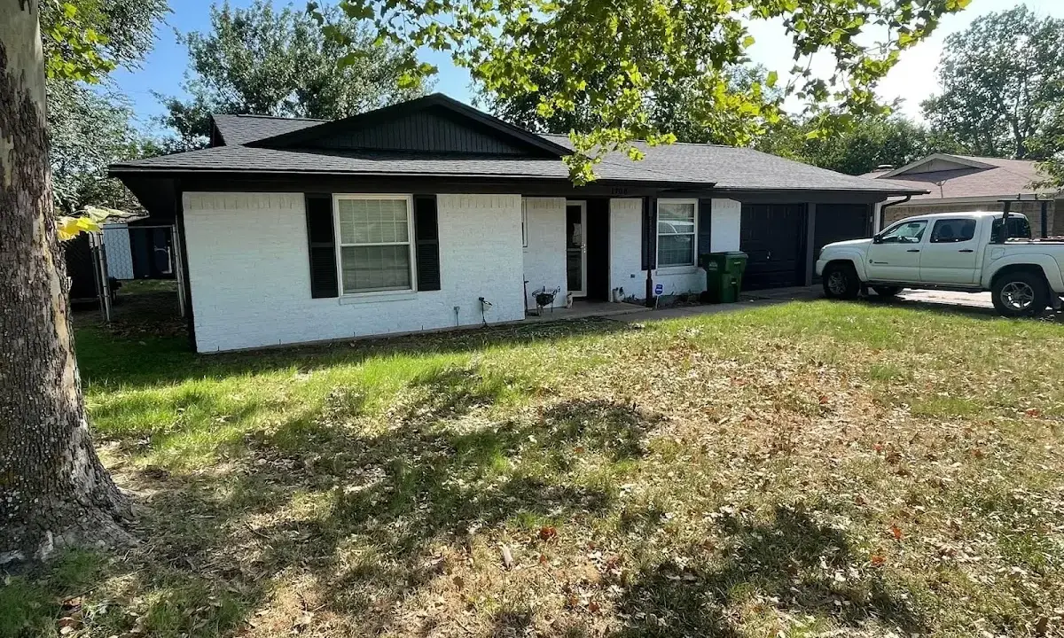 Professional roofing crew working on a residential roof in Marion Oaks